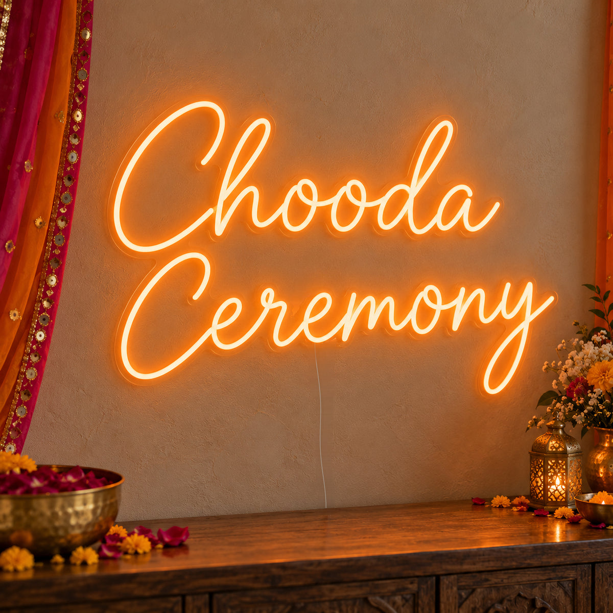 Chooda Ceremony Neon Sign on clear cut-to-shape acrylic, illuminated on a wall in a styled celebration setting