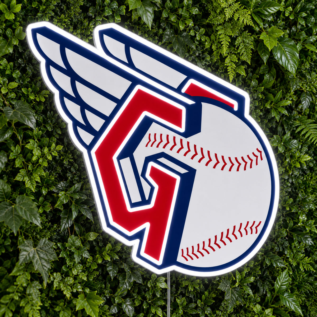 Cleveland Guardians LED Neon Sign, featuring illuminated team logo on a green foliage wall.