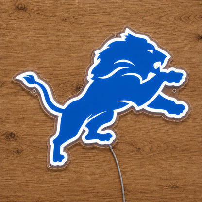 Detroit Lions LED Neon Sign, featuring illuminated team logo on a wooden surface.