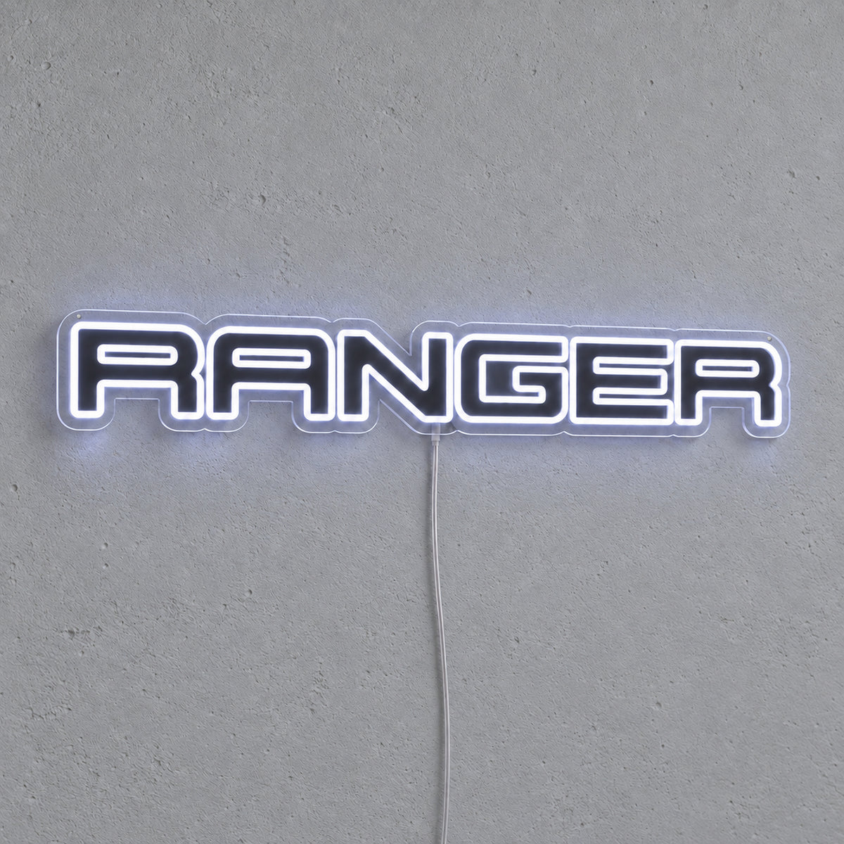 Ford Ranger LED Neon Sign in white, featuring Ranger lettering on a grey wall.
