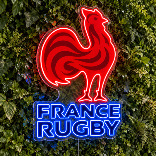 France Rugby LED Neon Sign, featuring team logo displayed on a green foliage wall.