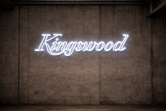 Neon sign with 'Kingswood' on a textured wall depicting the Holden Kingswood Car Logo