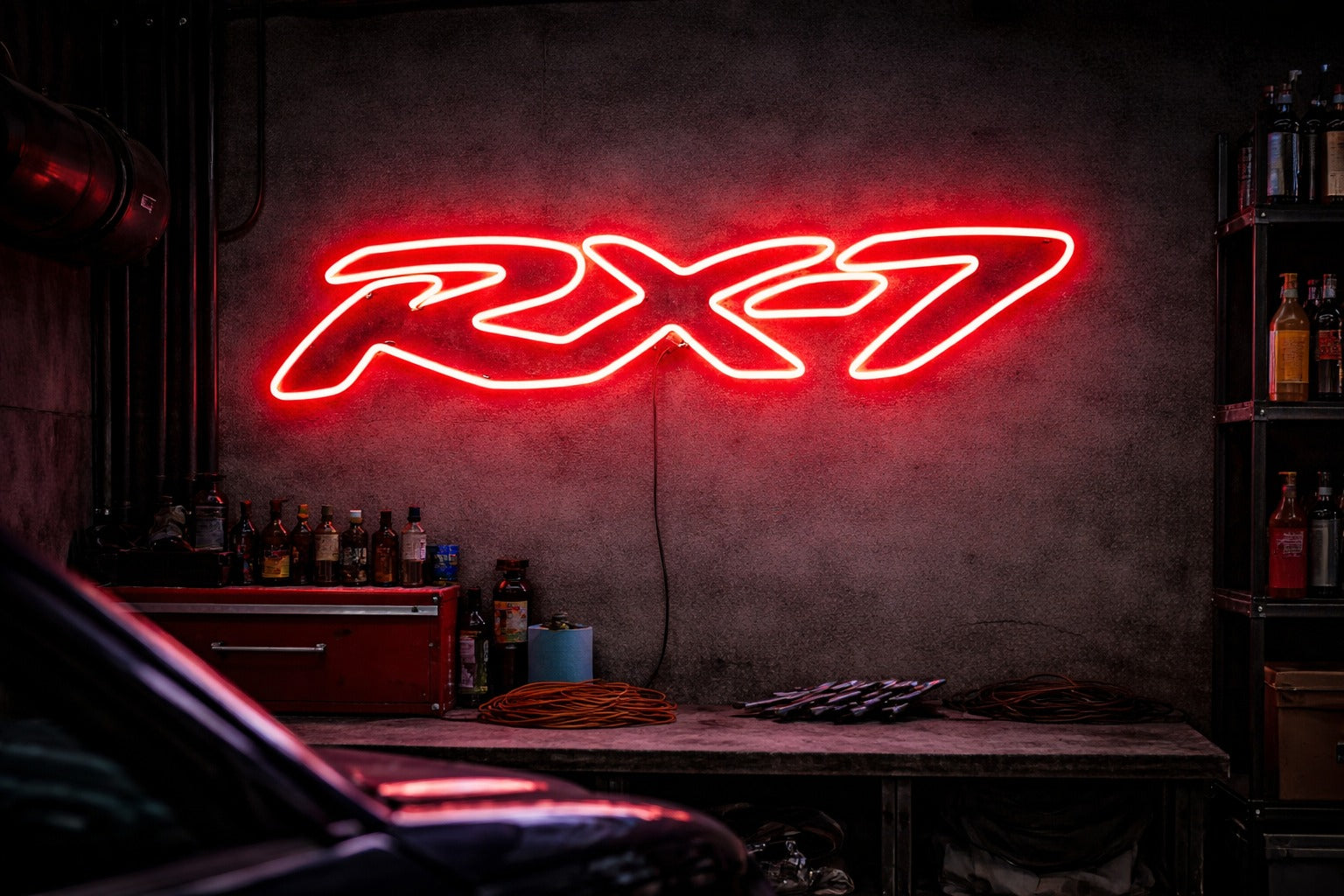 Mazda RX7 LED neon sign glowing in a JDM styled garage, classic rotary performance wall light
