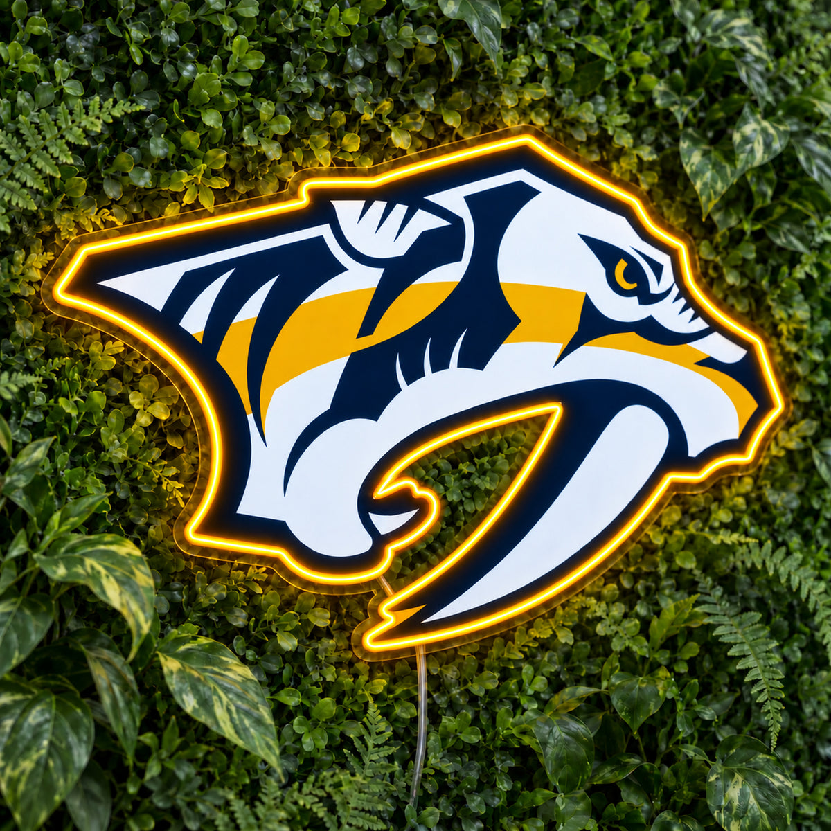 Nashville Predators LED Neon Sign, featuring team logo displayed on a green foliage wall.