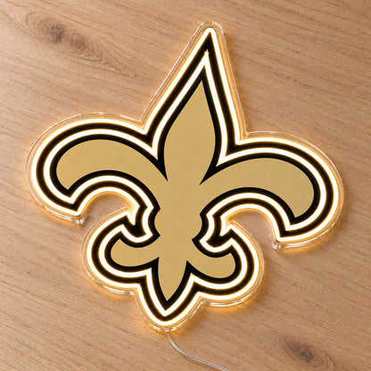 New Orleans Saints LED Neon Sign, featuring team logo displayed on a wooden surface.