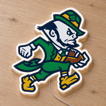 Notre Dame LED Neon Sign, featuring team logo displayed on a wooden surface.