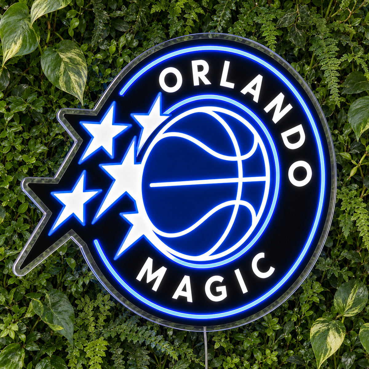 Orlando Magic LED Neon Sign, featuring illuminated team logo on a green foliage wall.