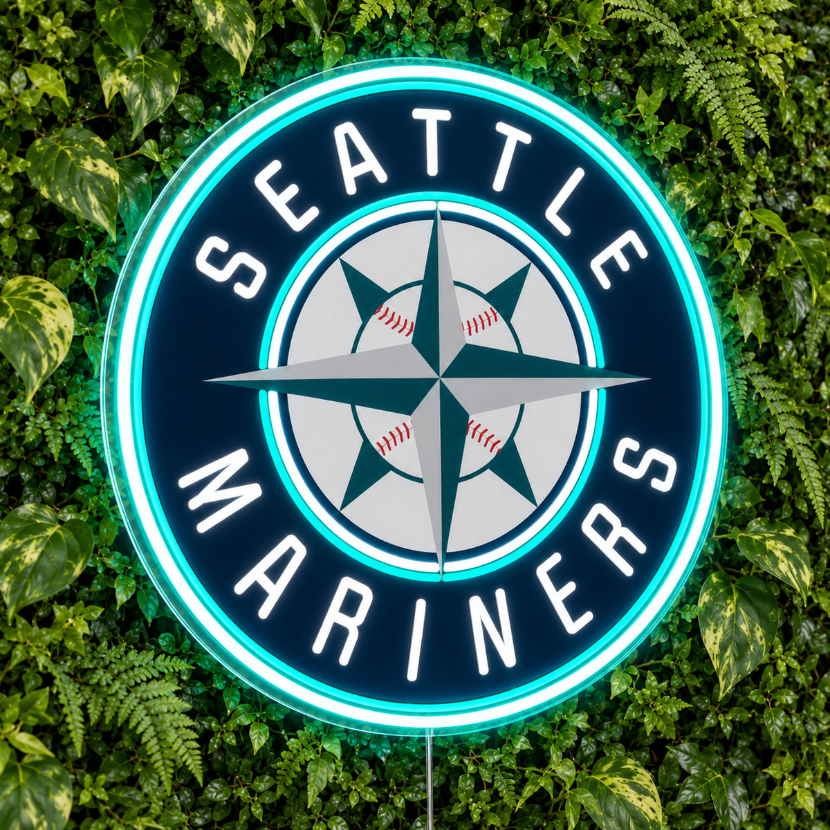 Seattle Mariners LED Neon Sign, featuring illuminated team logo on a green foliage wall.