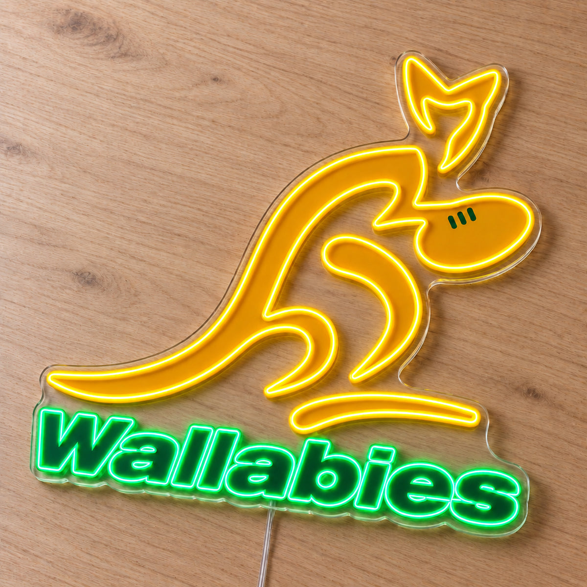 Wallabies Australia Rugby LED Neon Sign, featuring team logo displayed on a wooden surface.