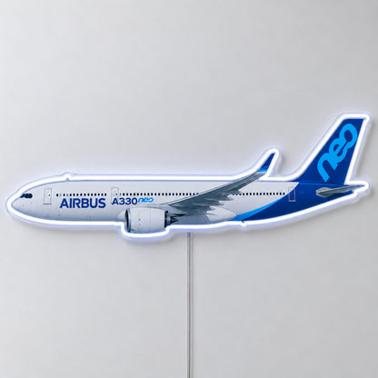 Airbus A330neo Neon Sign with printed aircraft details and an illuminated LED outline on clear acrylic, shown from the front on a white surface