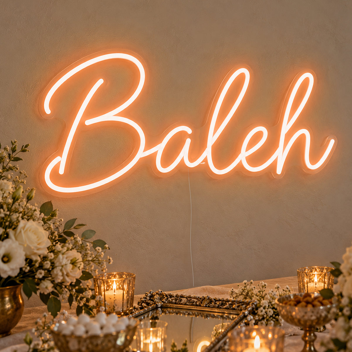 Baleh Neon Sign in orange LED neon on clear acrylic, angled view