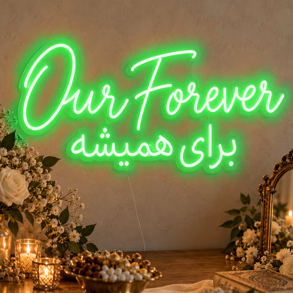 Our Forever English & Persian Neon Sign in green LED neon on clear acrylic, angled view