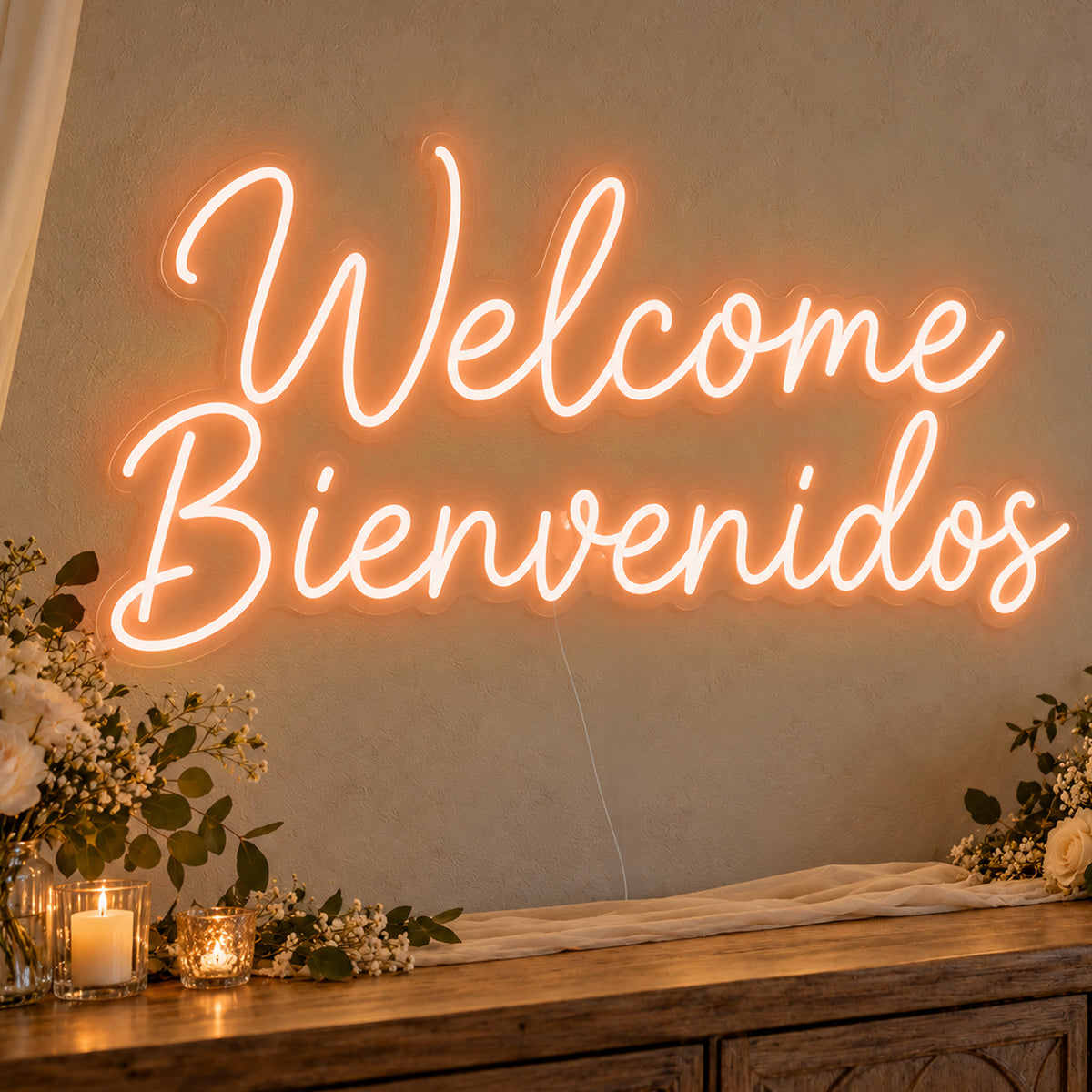 Welcome English & Spanish Neon Sign in orange LED neon on clear acrylic, angled view
