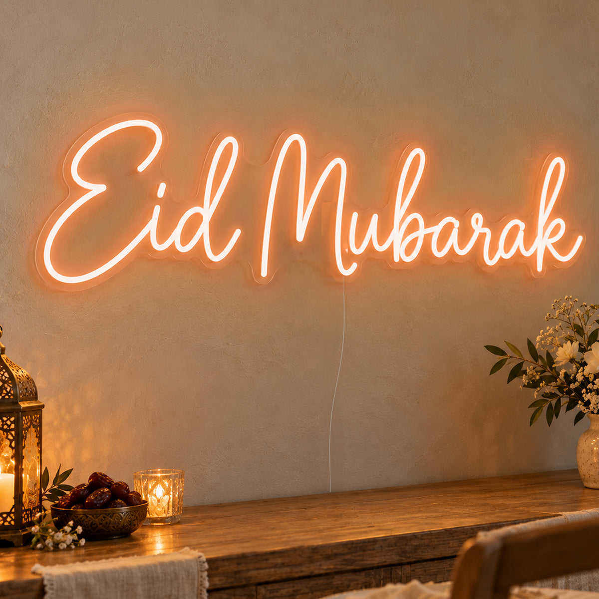 Eid Mubarak Neon Sign in orange LED neon on clear acrylic, angled view