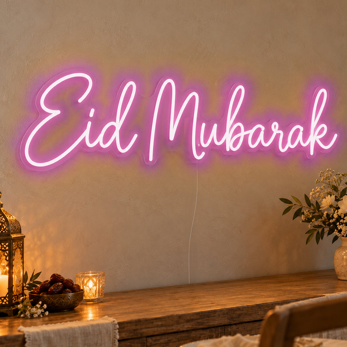 Eid Mubarak Neon Sign in pink LED neon on clear acrylic, angled view
