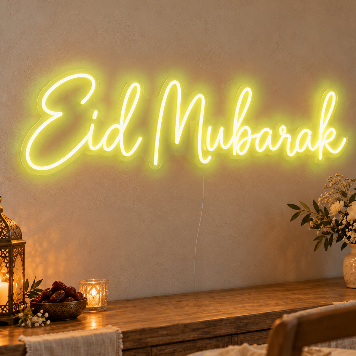 Eid Mubarak Neon Sign in yellow LED neon on clear acrylic, angled view
