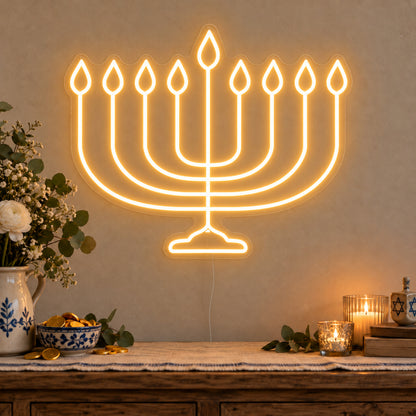 Hanukkiah Neon Sign on clear cut-to-shape acrylic, illuminated on a wall in a styled celebration setting