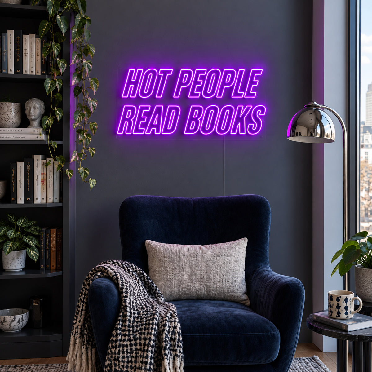 Hot People Read Books Neon Sign with purple lighting, displayed above a blue reading chair.