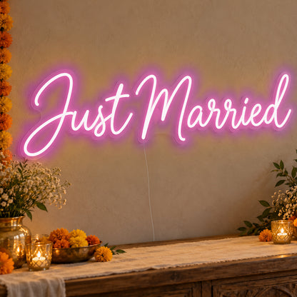 Just Married Neon Sign in pink LED neon on clear acrylic, angled view