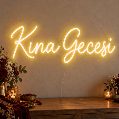 Kına Gecesi Neon Sign in gold LED neon on clear acrylic, angled view