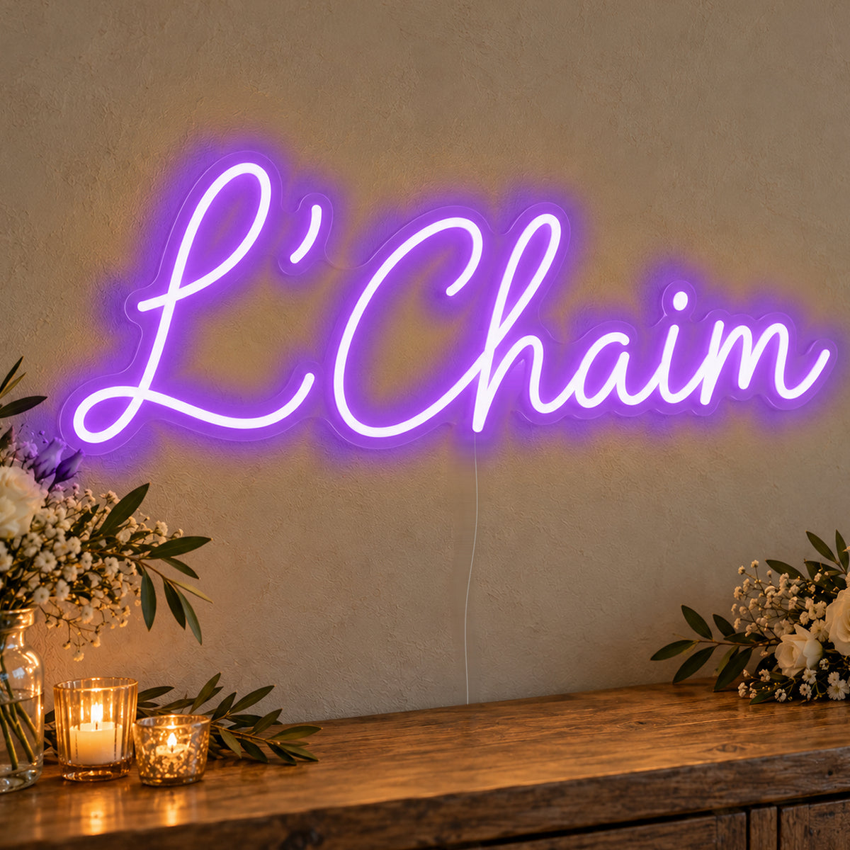 L’Chaim Neon Sign in purple LED neon on clear acrylic, angled view