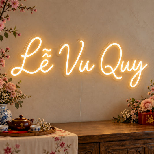 Lễ Vu Quy Neon Sign on clear cut-to-shape acrylic, illuminated on a wall in a styled celebration setting