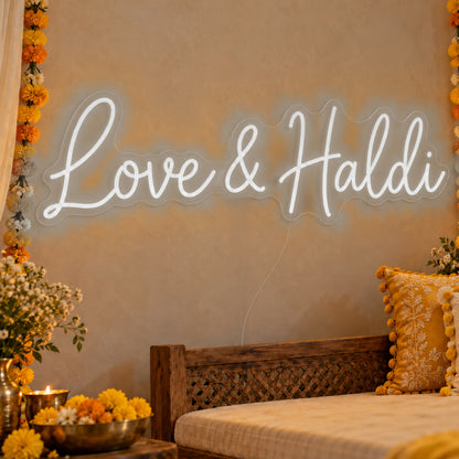 Love Haldi Neon Sign in white LED neon on clear acrylic, angled view