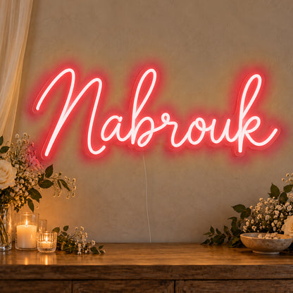 Mabrouk Neon Sign in red LED neon on clear acrylic, angled view