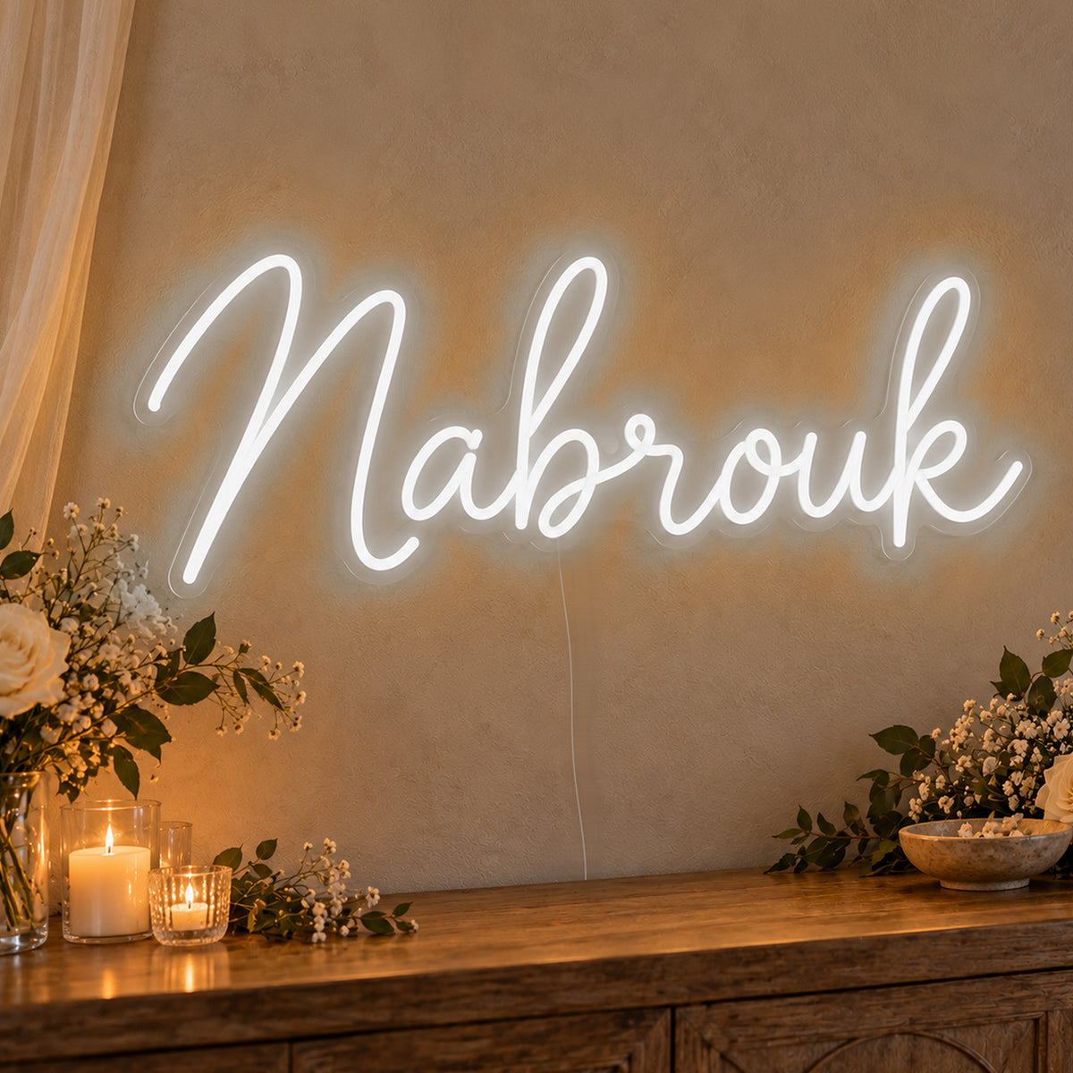 Mabrouk Neon Sign in white LED neon on clear acrylic, angled view