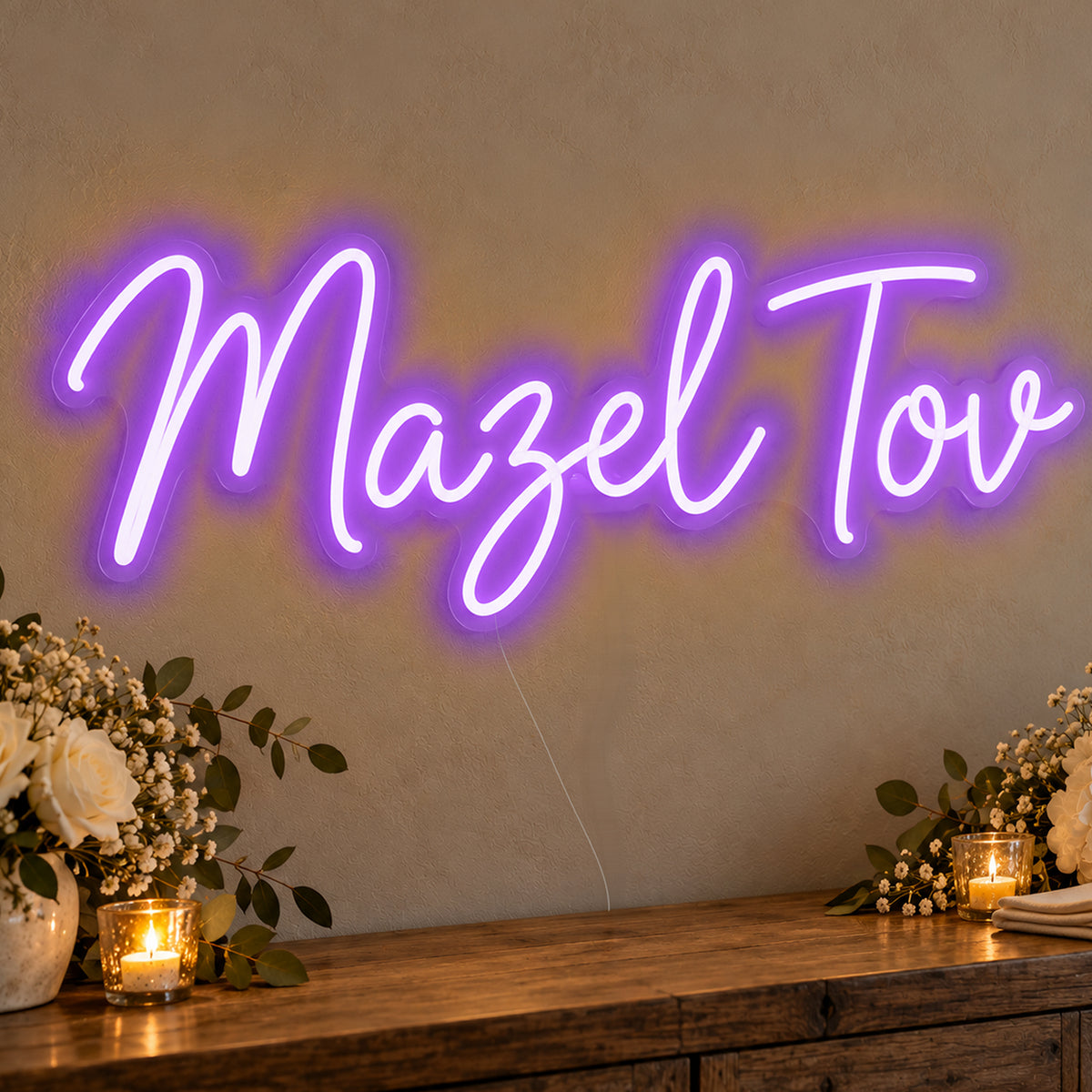 Mazel Tov Neon Sign in purple LED neon on clear acrylic, angled view