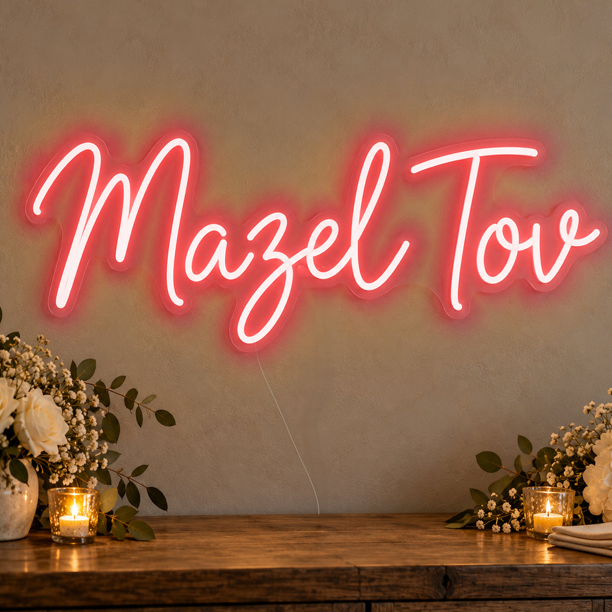 Mazel Tov Neon Sign in red LED neon on clear acrylic, angled view