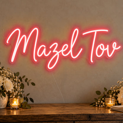Mazel Tov Neon Sign in red LED neon on clear acrylic, angled view