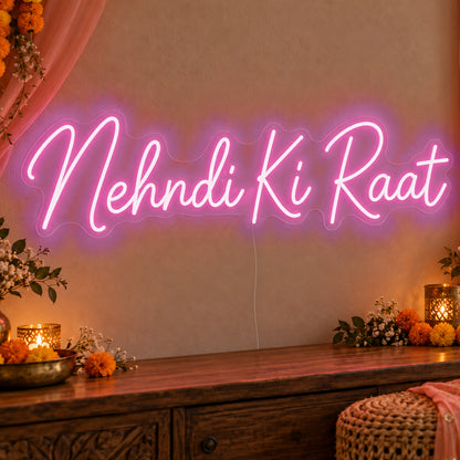 Mehndi Ki Raat Neon Sign in pink LED neon on clear acrylic, angled view
