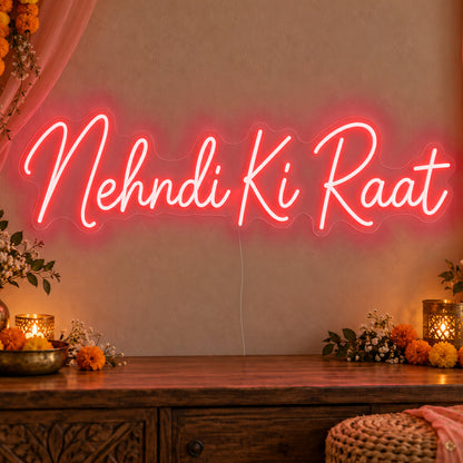 Mehndi Ki Raat Neon Sign in red LED neon on clear acrylic, angled view