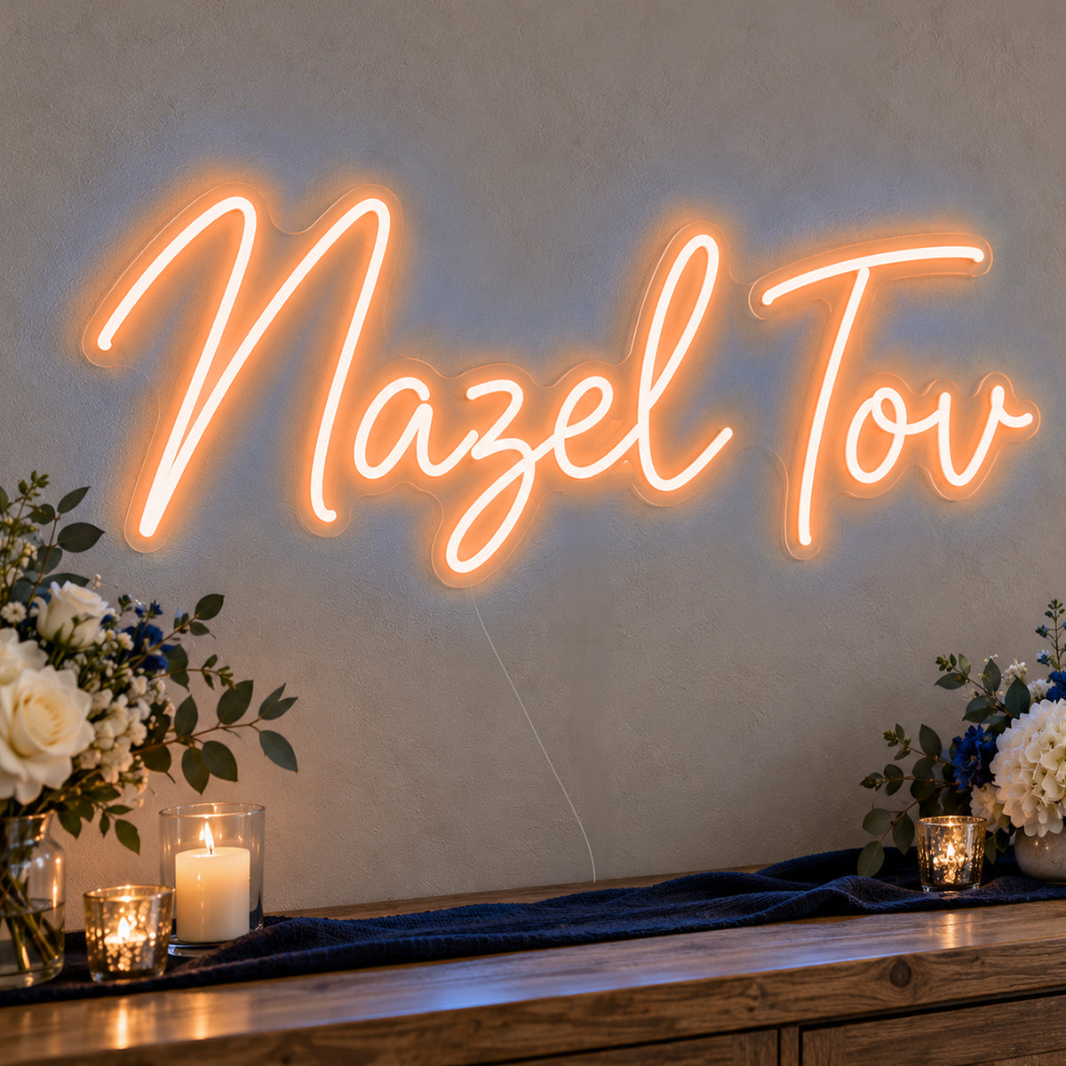 Mazel Tov Blue Neon Sign in orange LED neon on clear acrylic, angled view