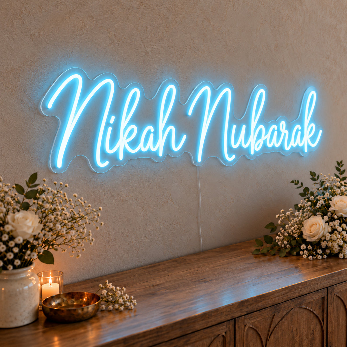 Nikah Mubarak Neon Sign in ice blue LED neon on clear acrylic, angled view
