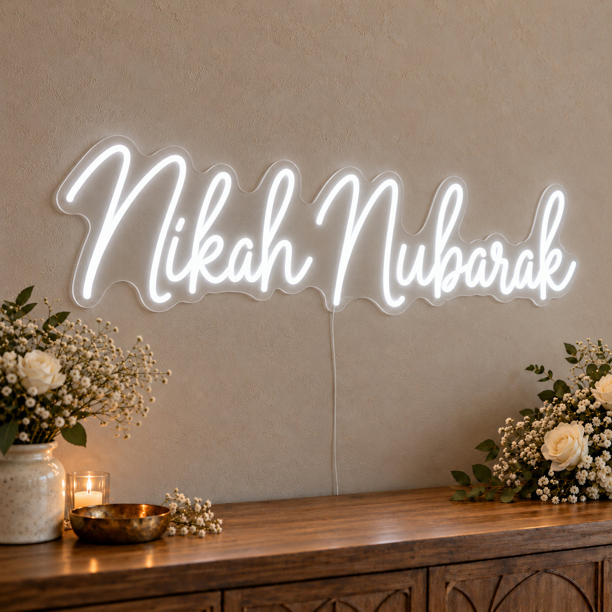 Nikah Mubarak Neon Sign in white LED neon on clear acrylic, angled view