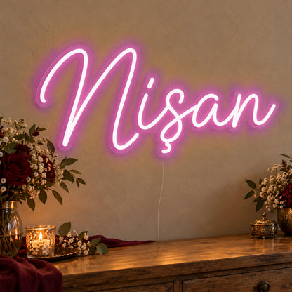 Nişan Neon Sign in pink LED neon on clear acrylic, angled view
