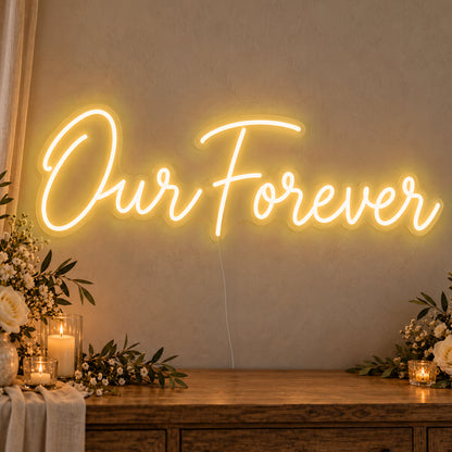 Our Forever Neon Sign in gold LED neon on clear acrylic, angled view