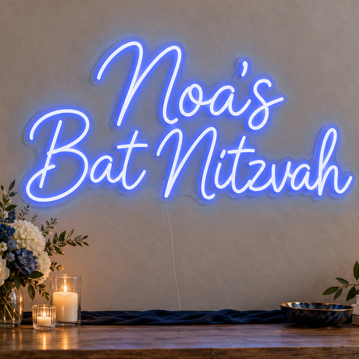 Personalised Bat Mitzvah Neon Sign in blue LED neon on clear acrylic, angled view