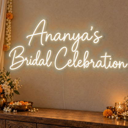 Personalised Bridal Celebration Neon Sign in warm white LED neon on clear acrylic, angled view