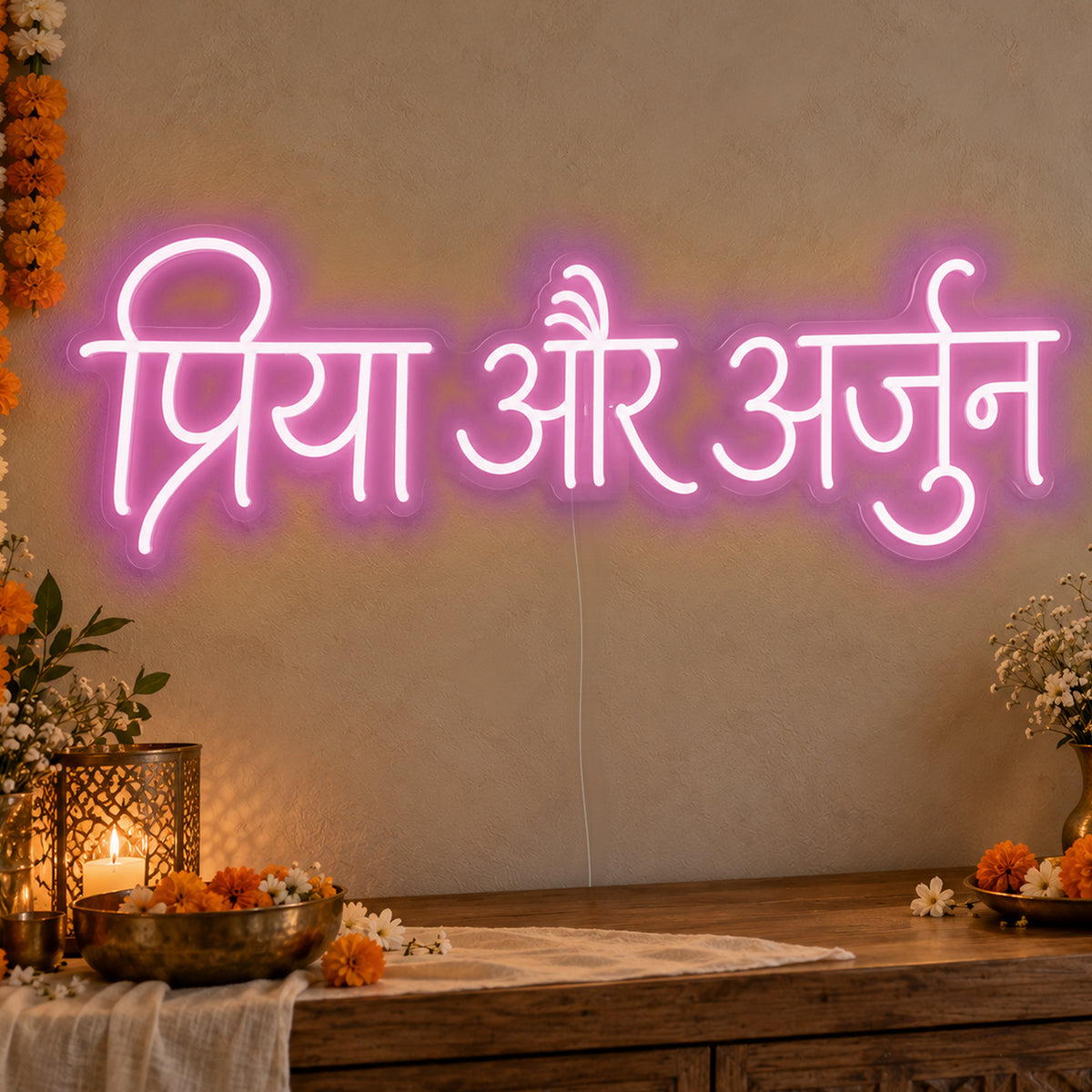 Personalised Devanagari Couple Names Neon Sign in pink LED neon on clear acrylic, angled view