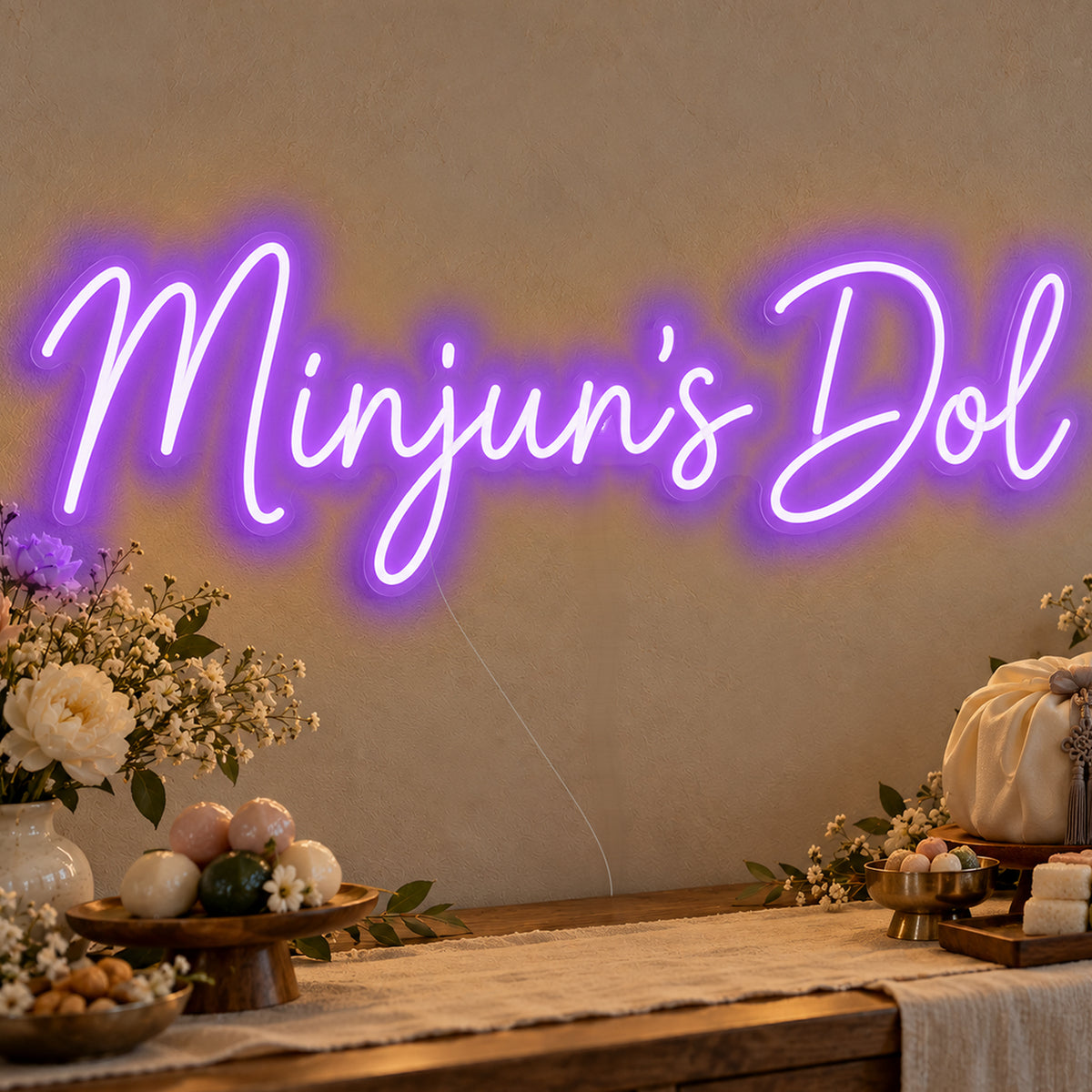 Personalised Dol Neon Sign in purple LED neon on clear acrylic, angled view