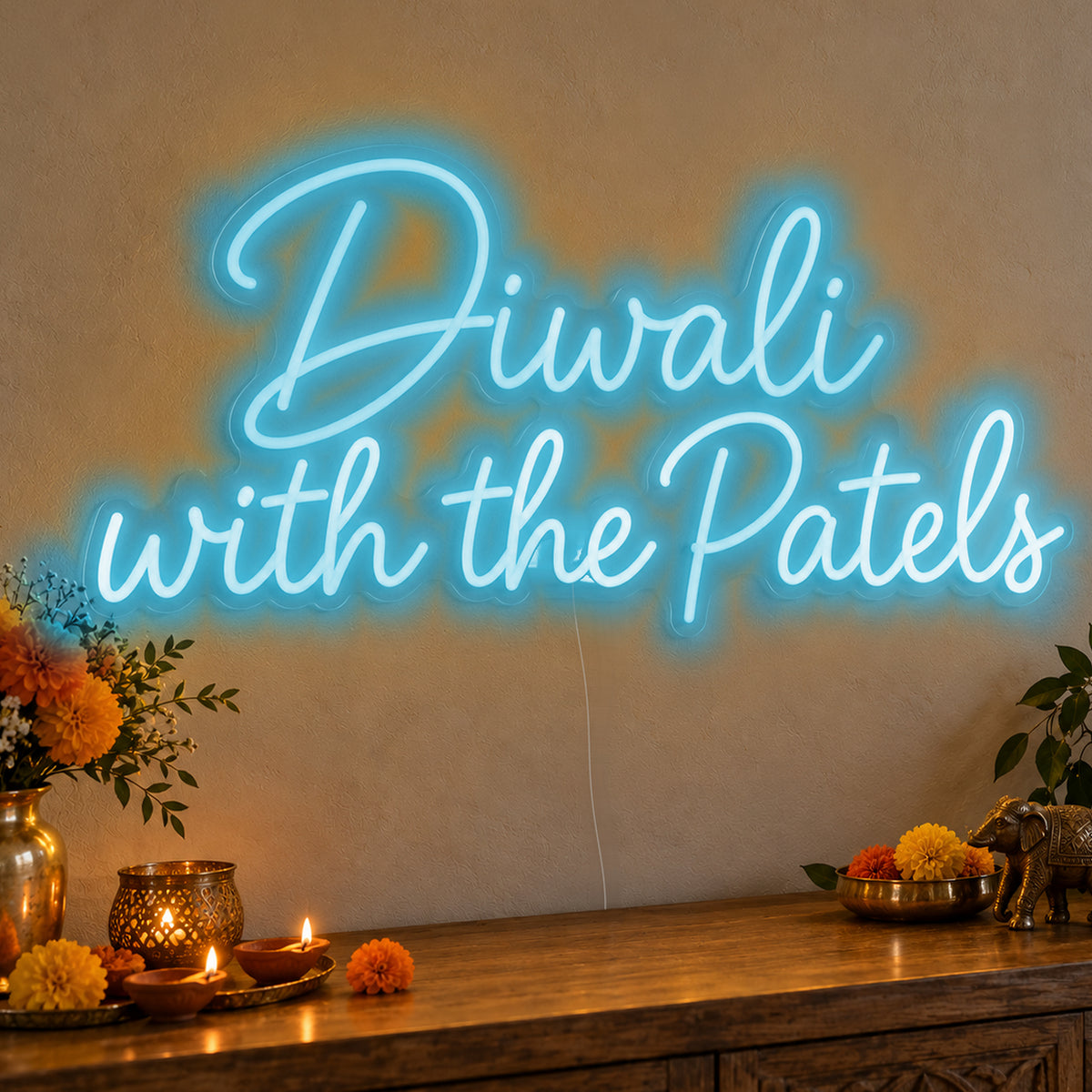 Personalised Family Diwali Neon Sign in ice blue LED neon on clear acrylic, angled view