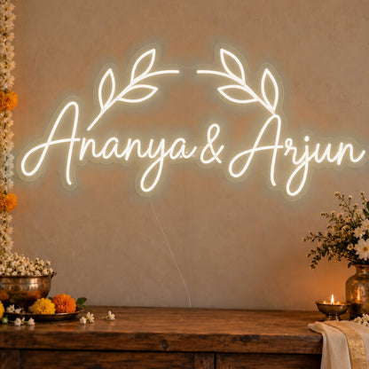Personalised Floral Arch Names Neon Sign in warm white LED neon on clear acrylic, angled view