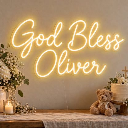 Personalised God Bless Neon Sign in gold LED neon on clear acrylic, angled view