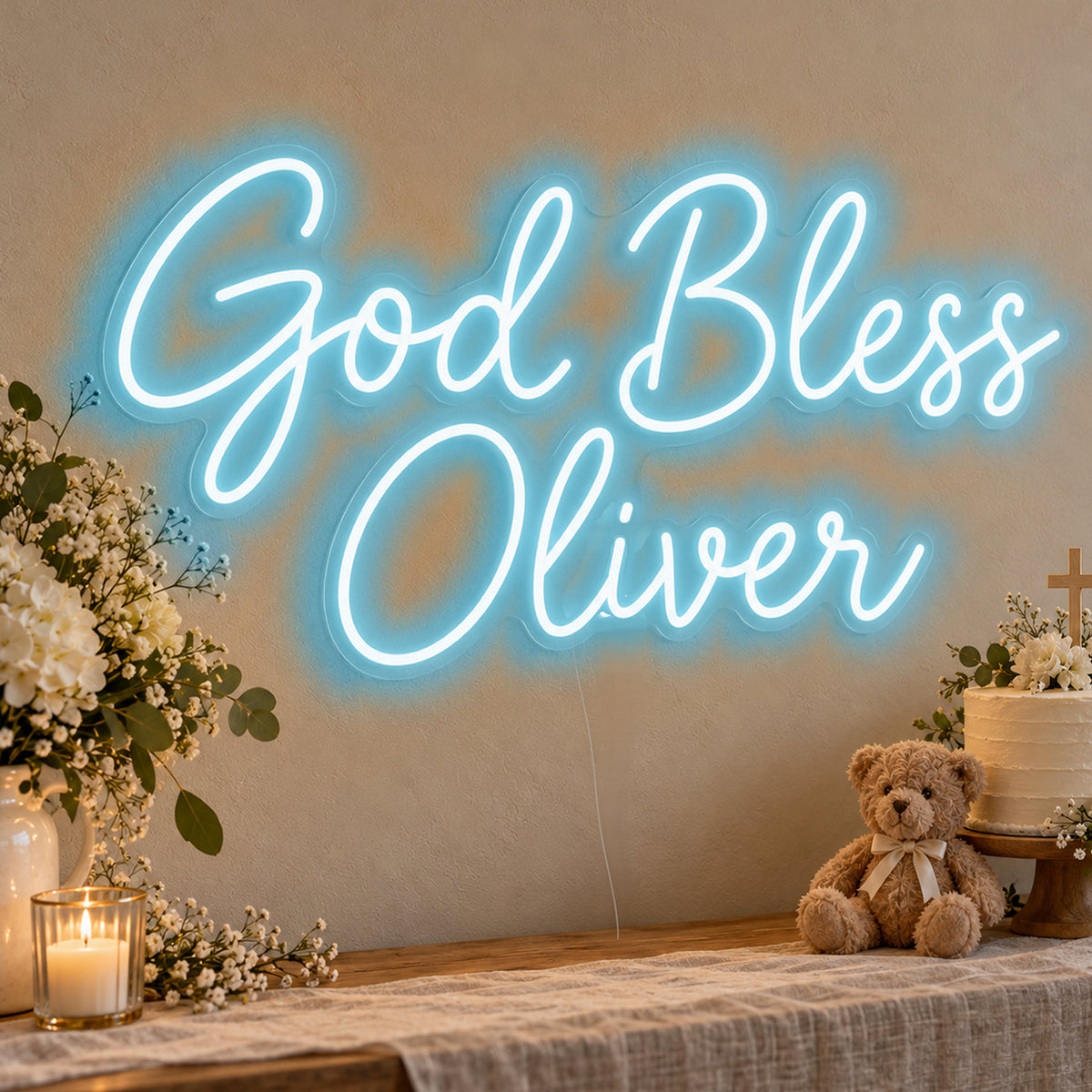 Personalised God Bless Neon Sign in ice blue LED neon on clear acrylic, angled view