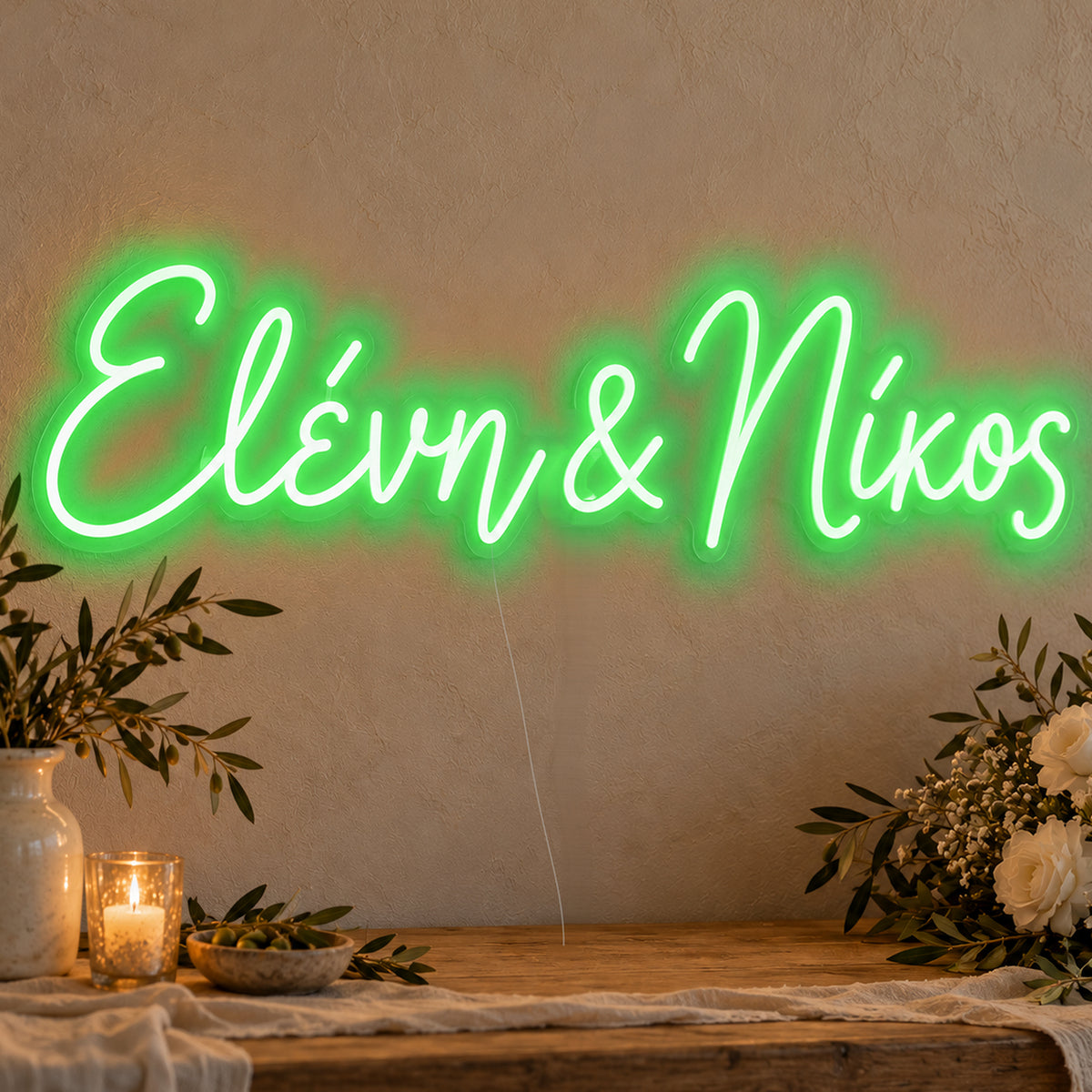Personalised Greek Couple Names Neon Sign in green LED neon on clear acrylic, angled view