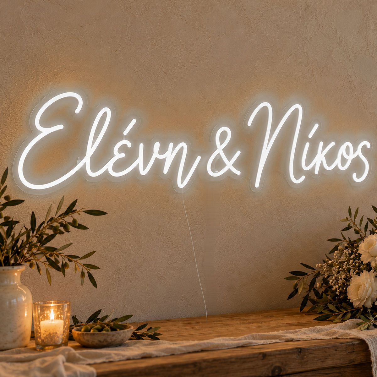 Personalised Greek Couple Names Neon Sign in white LED neon on clear acrylic, angled view