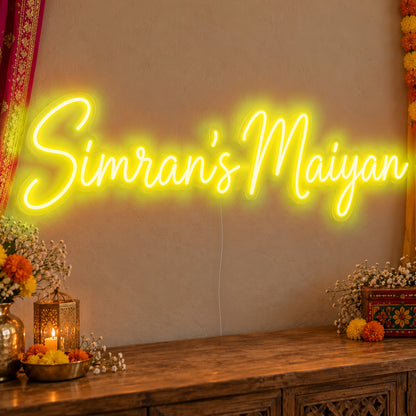 Personalised Maiyan Neon Sign in yellow LED neon on clear acrylic, angled view